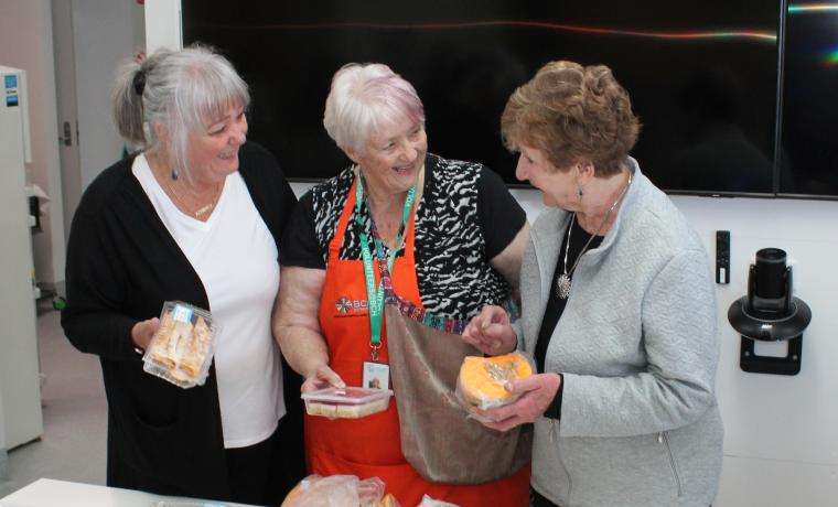 Fete helper Kerry Napolitano, her sister Leonie Thomas and Barbara Culph sold baked goods, preserves and produce at the fete. Leonie and Barbara are members of the Bass Coast Health Ladies Auxiliary.