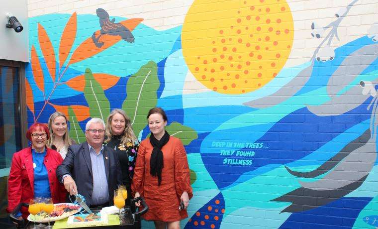 Celebrating the official opening of the Rotary Club of Inverloch’s mural in the courtyard at Kodowlinun ward at Wonthaggi Hospital are, from left, Rosa Turner, Past President of Rotary, artist Raewyn Petracca, Rotary President Pat Barry, artist Amanda Watts and Bass Coast Health’s Executive Director of People and Culture, and Acute Clinical Services, Christine Henderson.