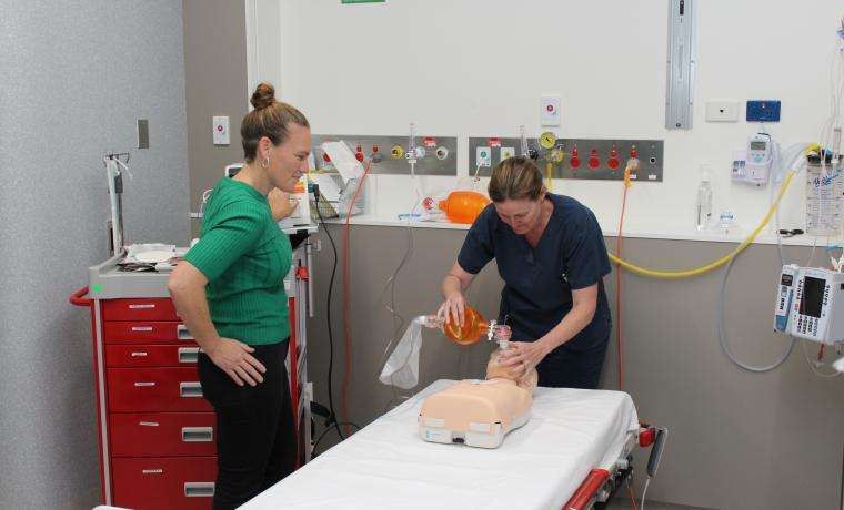 Emergency Department Clinical Nurse Educator Liz Friswell, right, practises Advanced Paediatric Life Support with colleague Fiona Foon at Wonthaggi Hospital.