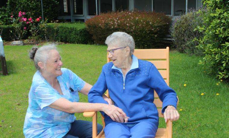 Endorsed Enrolled Nurse Carolyn Milnes chats with resident Roberta 'Bobbie' Speed at Griffiths Point  Lodge.